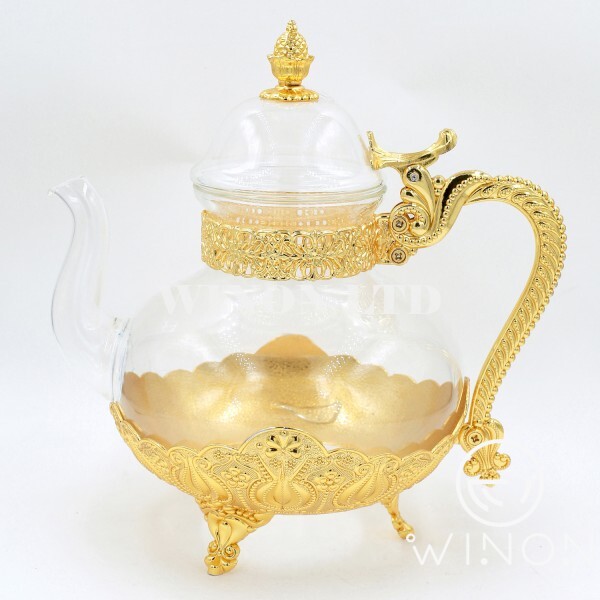 Golden plated glass pot